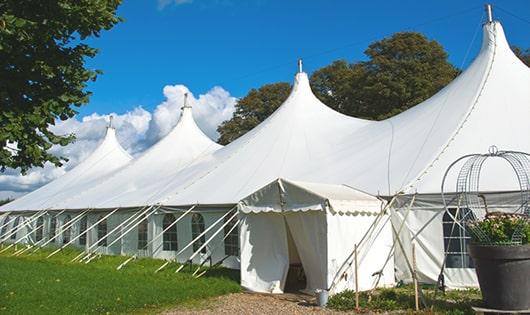 multiple portable restrooms for large-scale outdoor events, ensuring availability for all guests in Wilton